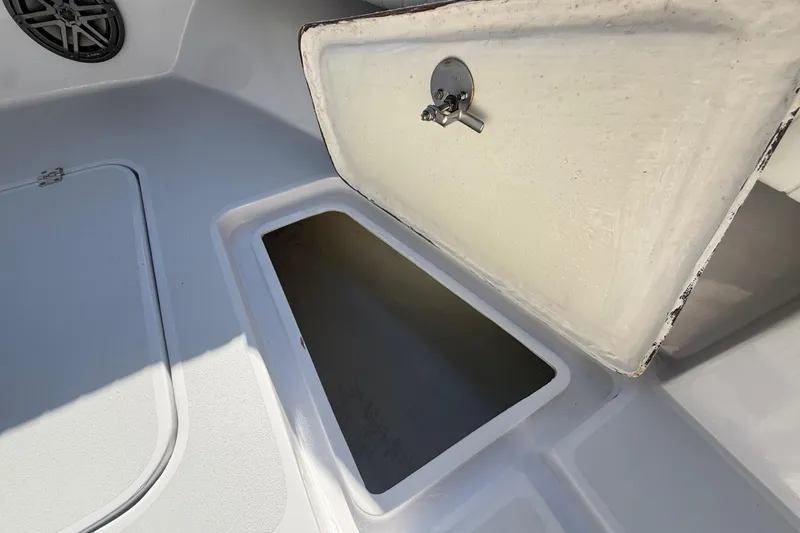 Slide: The Image of Open storage compartment on a 1984 Chris-Craft 213 Scorpion boat. - 43