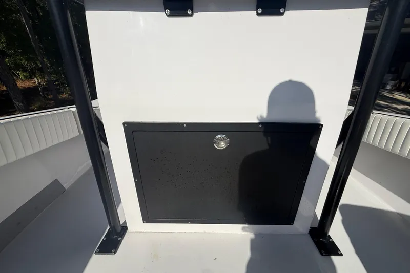 Slide: The Image of 1984 Chris-Craft 213 Scorpion boat interior with storage compartment and seating. - 51