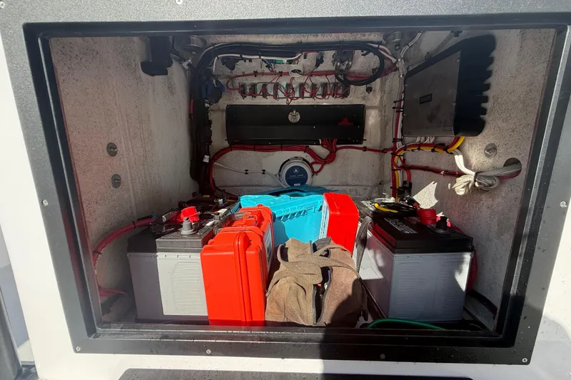 Slide: The Image of 1984 Chris-Craft 213 Scorpion engine compartment with batteries and wiring. - 52