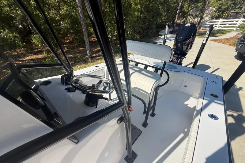 Slide: The Image of 1984 Chris-Craft 213 Scorpion boat interior with steering wheel and seating. - 56