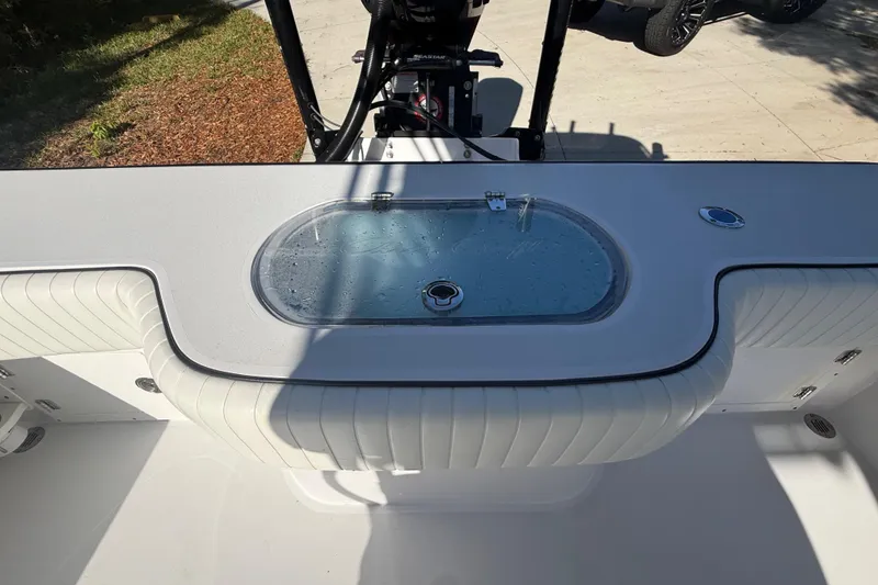 Slide: The Image of 1984 Chris-Craft 213 Scorpion boat interior with livewell and seating. - 67