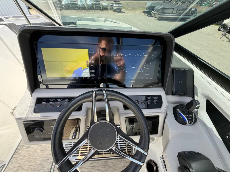 Slide: The Image of 2023 Cobalt R8 Outboard cockpit with advanced navigation systems. - 11