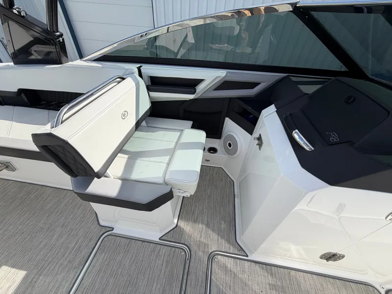 Slide: The Image of Interior of 2023 Cobalt R8 Outboard featuring luxurious seating. - 12