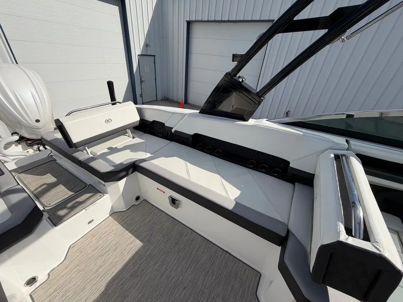 Slide: The Image of Interior of 2023 Cobalt R8 Outboard featuring luxurious seating. - 14