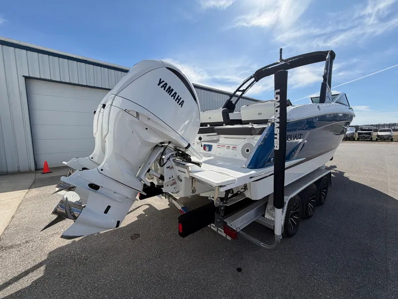 Slide: The Image of 2023 Cobalt R8 Outboard boat with Yamaha engine on trailer. - 2