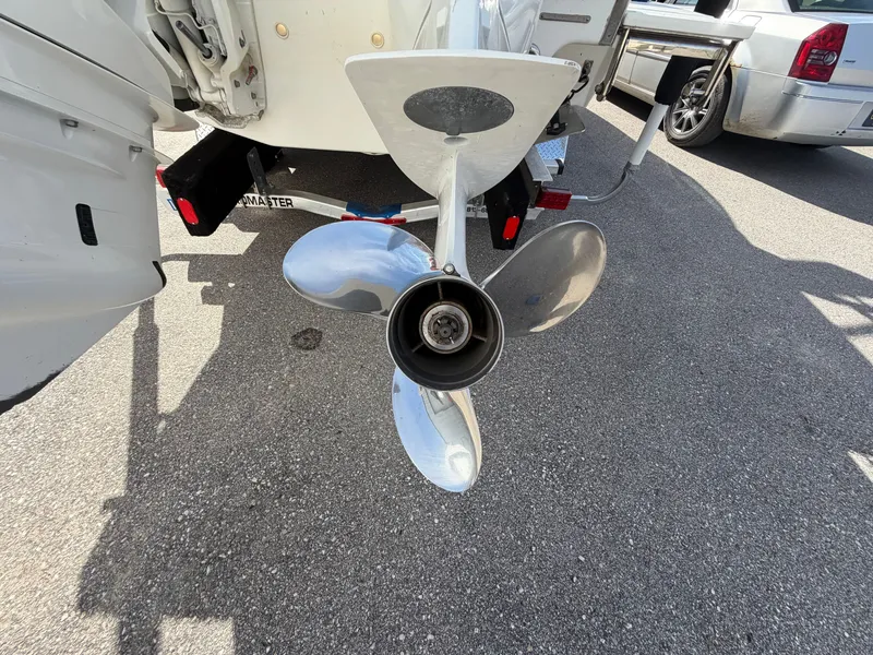 Slide: The Image of 2023 Cobalt R8 Outboard propeller on asphalt. - 22