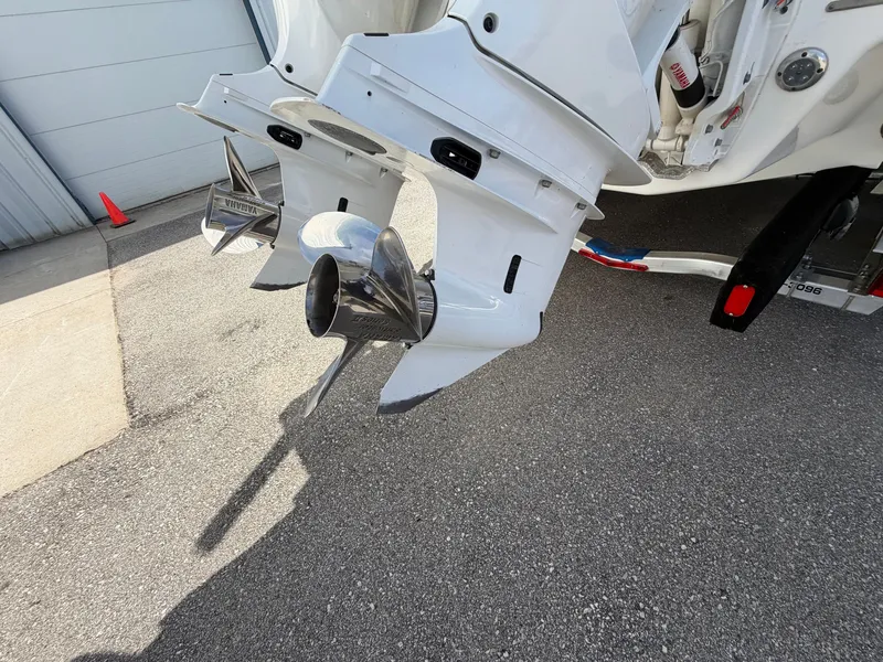 Slide: The Image of 2023 Cobalt R8 Outboard motor with shiny propellers. - 23