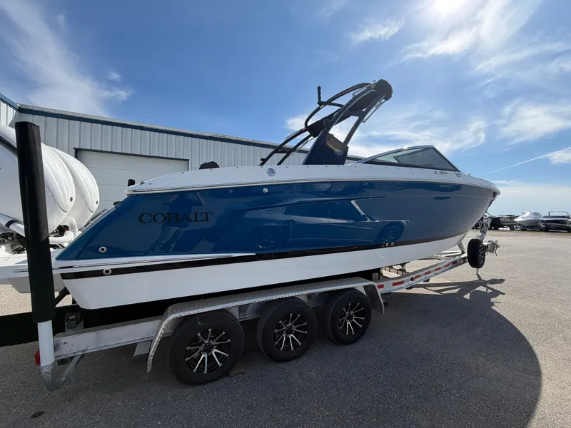 Slide: The Image of 2023 Cobalt R8 Outboard on trailer under sunny skies. - 3