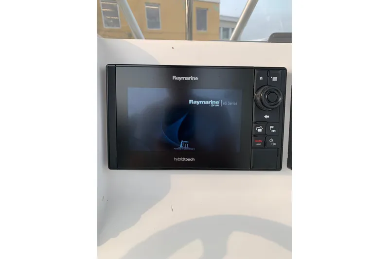 Slide: The Image of Raymarine display on 2006 Sea Hunt Triton 220 boat dashboard. - 14