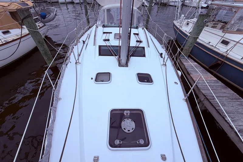 Slide: The Image of 2009 Beneteau Oceanis 40 sailboat docked at marina, top deck view. - 11