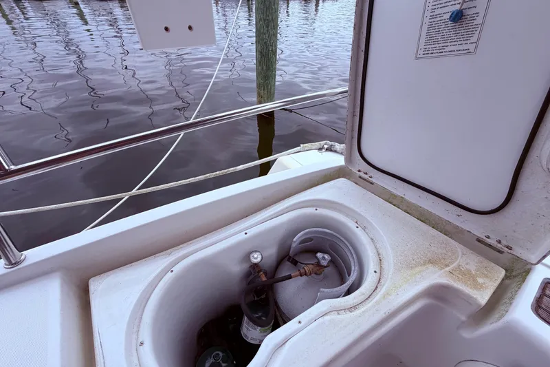 Slide: The Image of Propane locker on port side behind helm - 21