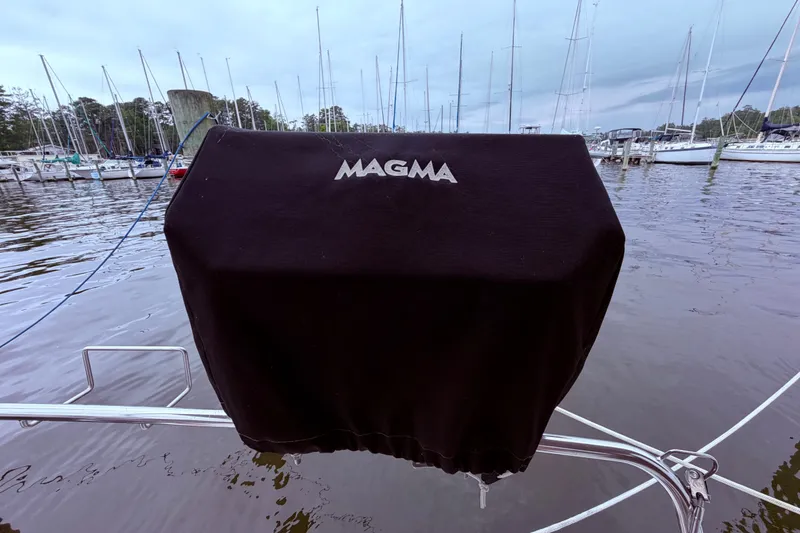 Slide: The Image of Magma grill attached to stern rail - 23