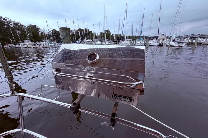 Slide: The Image of Magma grill attached to stern rail - 24