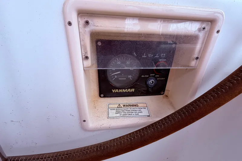 Slide: The Image of Control panel of a 2009 Beneteau Oceanis 40 sailboat with Yanmar engine gauge. - 28