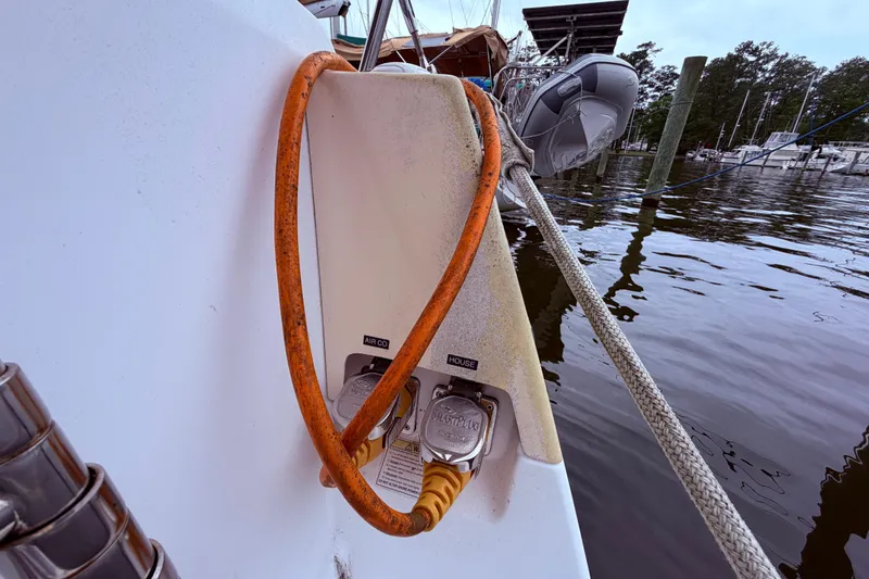 Slide: The Image of Beneteau Oceanis 40 (2009) docked, showing power connections - 32