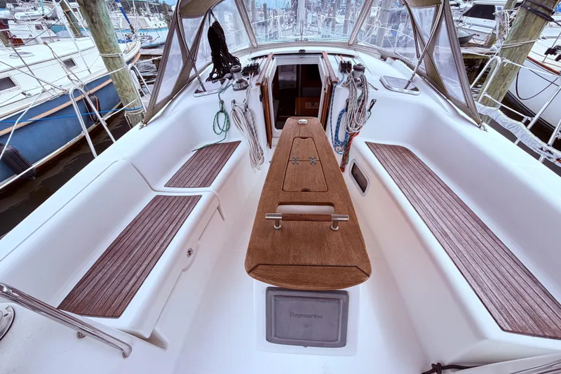 Slide: The Image of Cockpit of 2009 Beneteau Oceanis 40 sailboat with ropes and winches. - 36