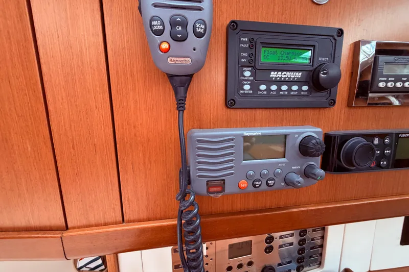 Slide: The Image of Interior of 2009 Beneteau Oceanis 40 yacht with cozy seating and elegant wood finishes. - 51