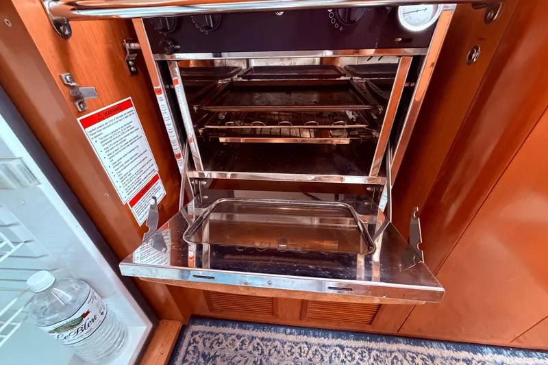 Slide: The Image of Control panel of a 2009 Beneteau Oceanis 40 sailboat with communication equipment. - 55