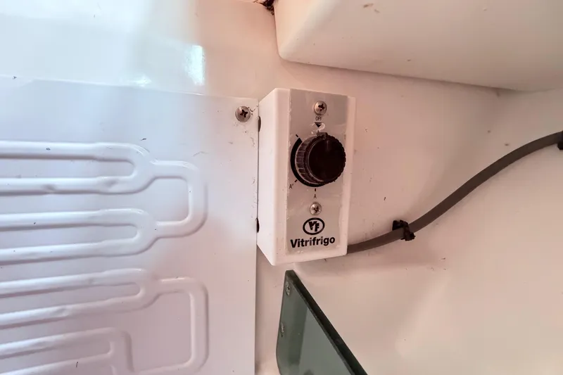 Slide: The Image of Control panel of a 2009 Beneteau Oceanis 40 yacht with keys and accessories. - 57