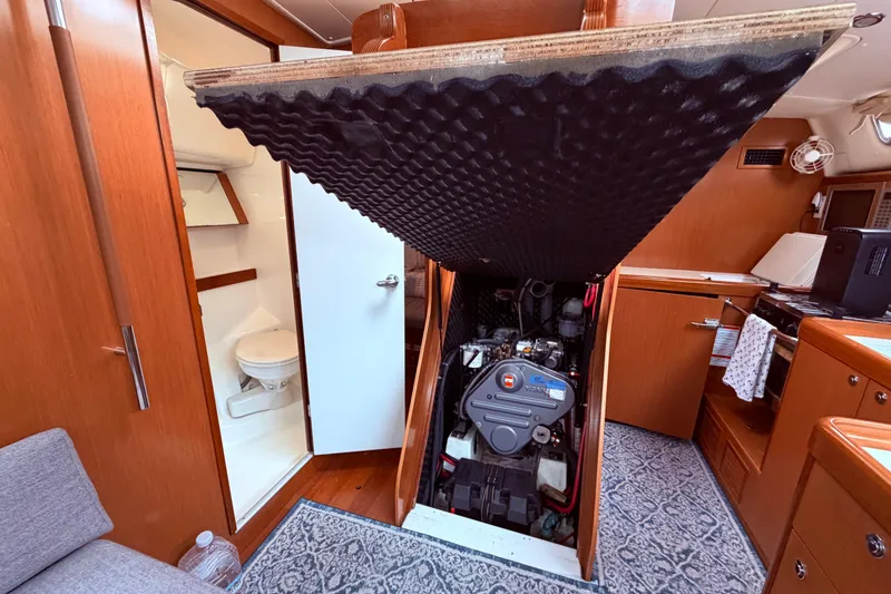 Slide: The Image of Yanmar engine housed under companionway - 88