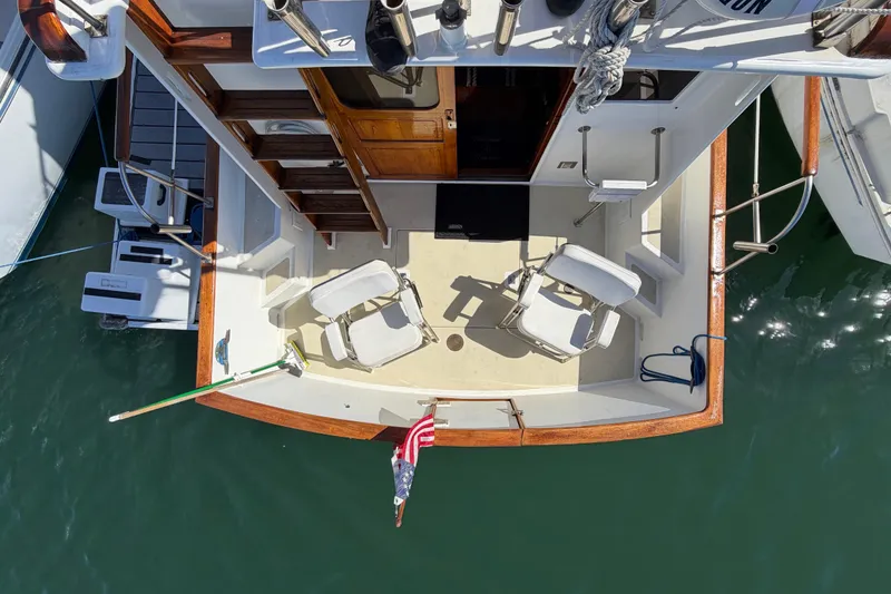 Slide: The Image of Aerial view of 1982 Lien Hwa 31 boat deck with chairs and American flag. - 13