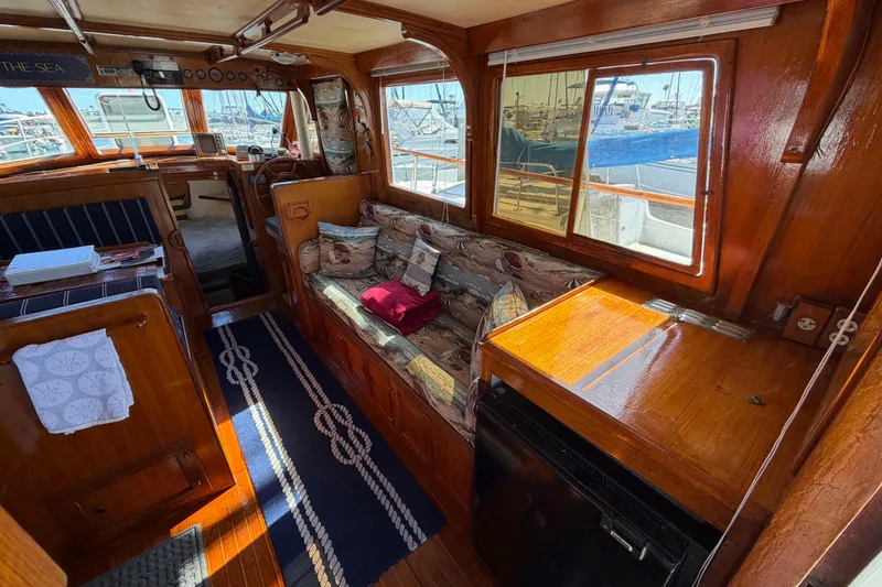 Slide: The Image of Interior of 1982 Lien Hwa 31 yacht with wooden furnishings and nautical decor. - 28