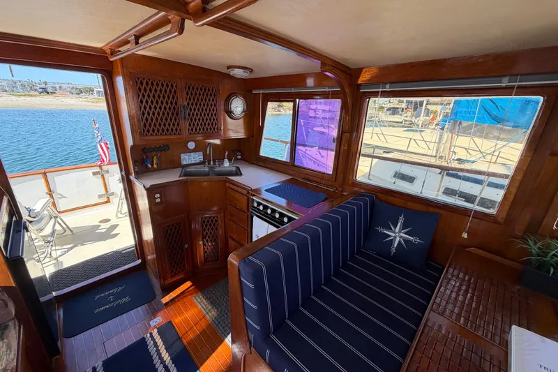 Slide: The Image of Interior of 1982 Lien Hwa 31 boat with wooden cabinetry and nautical decor. - 30