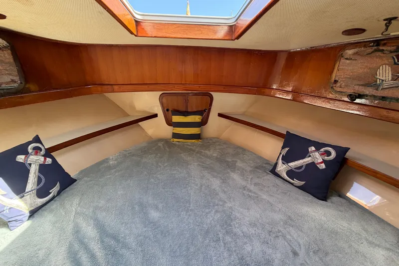 Slide: The Image of Cozy cabin interior of 1982 Lien Hwa 31 boat with nautical-themed pillows. - 46