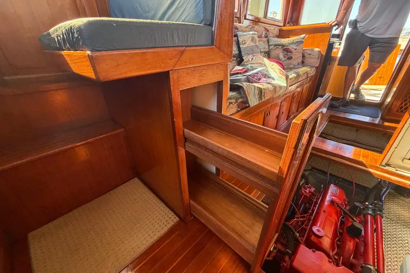 Slide: The Image of Interior of 1982 Lien Hwa 31 boat with wooden cabinetry and engine compartment. - 65
