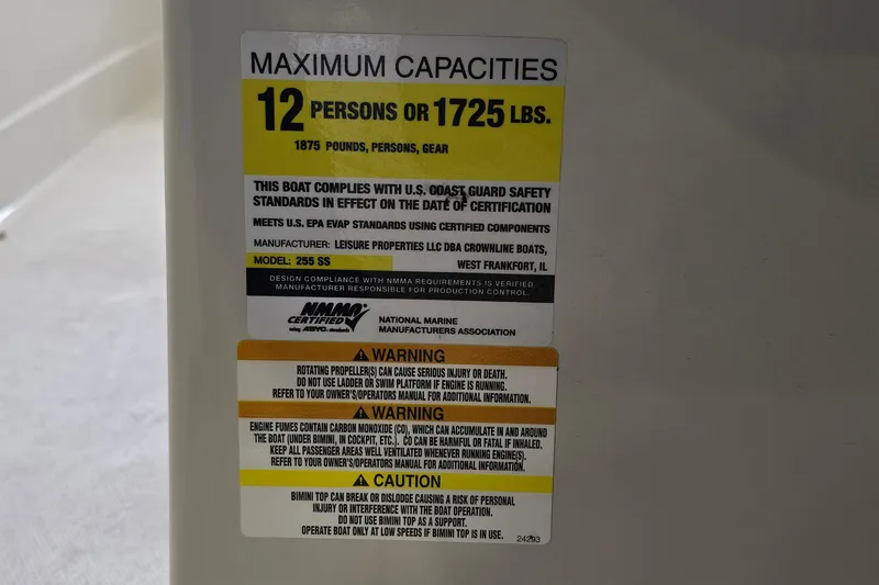Slide: The Image of Capacity label for 2014 Crownline 255 SS boat, maximum 12 persons or 1725 lbs. - 29