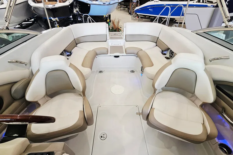 Slide: The Image of Interior view of 2014 Crownline 255 SS boat with spacious seating arrangement. - 7