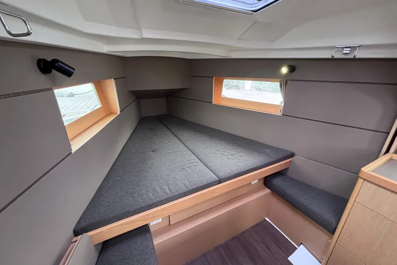 Slide: The Image of Interior cabin of 2015 Beneteau Oceanis 35 sailboat with cozy sleeping area. - 14