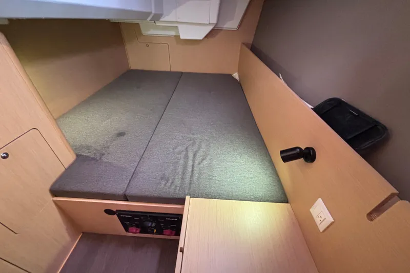 Slide: The Image of Interior cabin of 2015 Beneteau Oceanis 35 sailboat with cozy bed and modern design. - 20