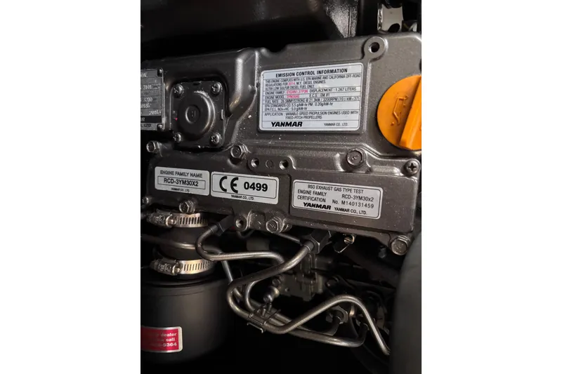 Slide: The Image of Engine details of a 2015 Beneteau Oceanis 35 sailboat, featuring Yanmar components. - 25