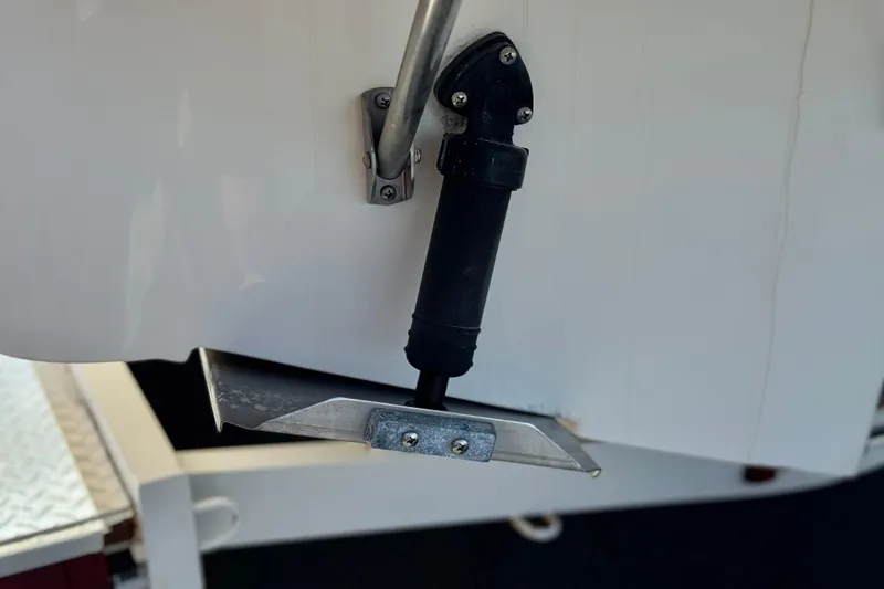 Slide: The Image of Trim tab on a 2004 Chaparral Signature 260 boat. - 10