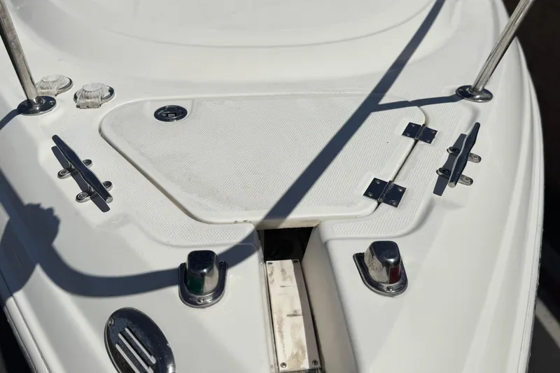 Slide: The Image of Bow deck of 2004 Chaparral Signature 260 boat with cleats and fittings. - 11