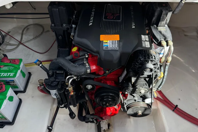 Slide: The Image of 2004 Chaparral Signature 260 engine compartment with Volvo Penta motor and batteries. - 20