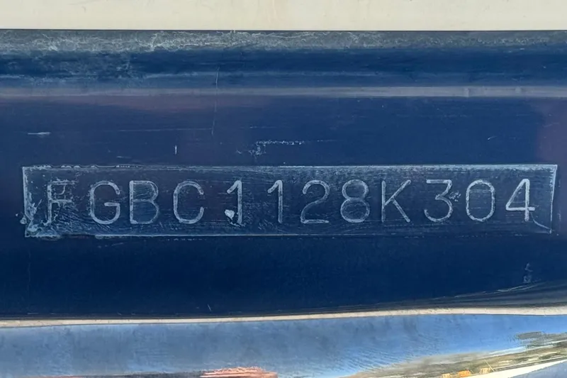 Slide: The Image of Hull identification number on a 2004 Chaparral Signature 260 boat. - 39