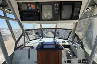 Slide: The Image of Cockpit of a 1990 Davis Radon Craft 22 boat with navigation equipment. - 12