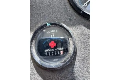 Slide: The Image of Engine hour meter on 1990 Davis Radon Craft 22, showing 1074.6 hours. - 15