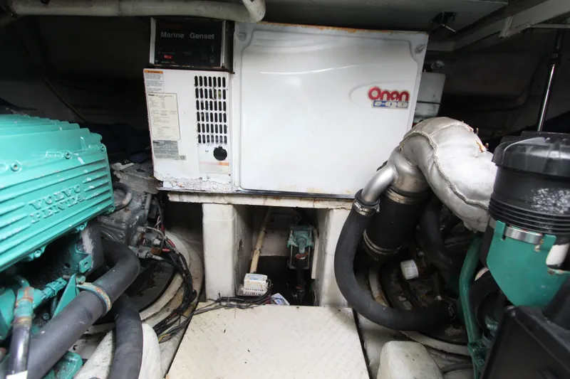 Slide: The Image of Engine room of a 2007 Cruisers 420 yacht with Volvo Penta and Onan generator. - 15
