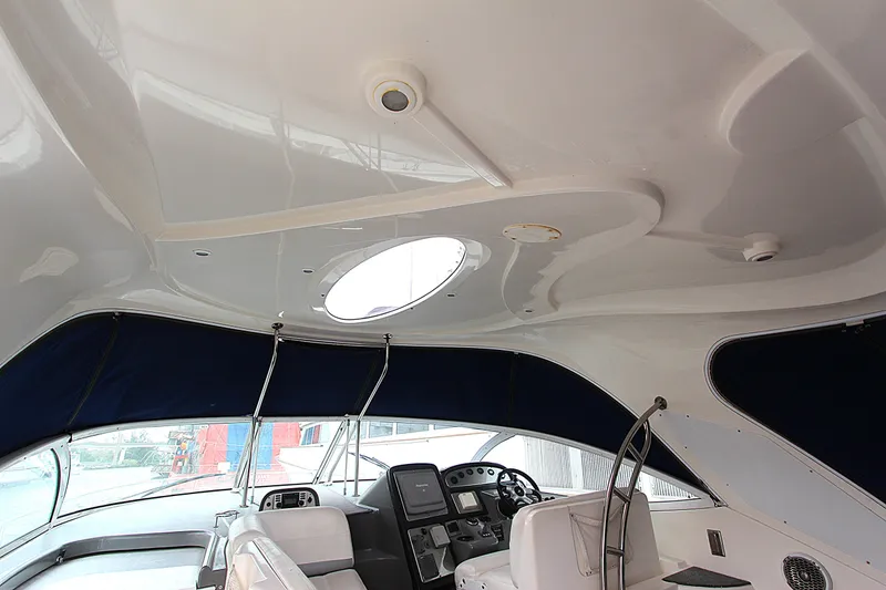 Slide: The Image of Interior view of 2007 Cruisers 420 yacht cockpit with modern controls and seating. - 5