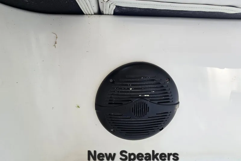 Slide: The Image of New speaker installed on 2001 Smoker Craft 2310 Commander boat. - 14