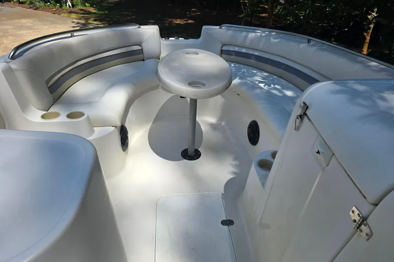Slide: The Image of 2001 Smoker Craft 2310 Commander boat interior with seating and table. - 18