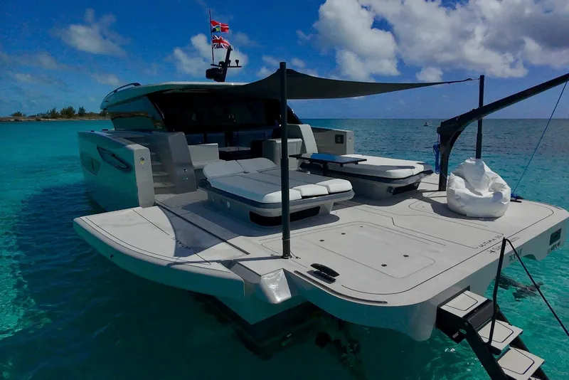 The Image of Luxury Sunreef Ultima 2026 yacht on turquoise water, featuring spacious deck and modern design. - 0