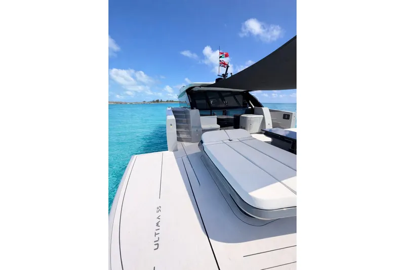 Slide: The Image of Luxurious 2026 Sunreef Ultima yacht on turquoise waters under a clear blue sky. - 11
