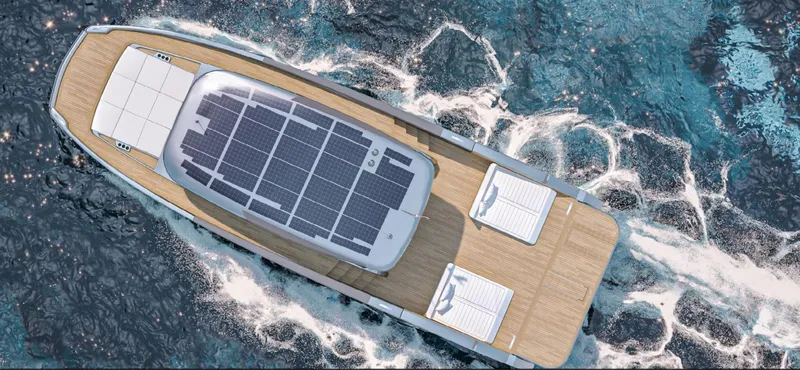 Slide: The Image of Aerial view of 2026 Sunreef Ultima yacht with solar panels and sun loungers on deck. - 21