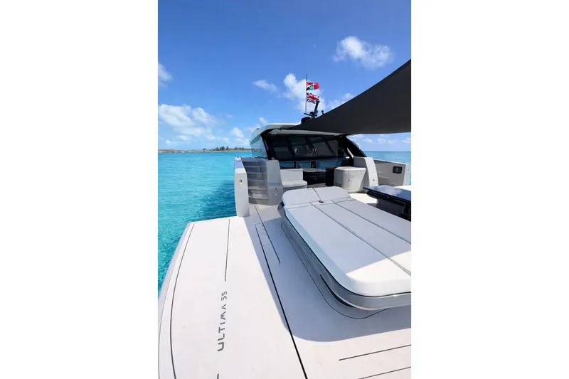 Slide: The Image of Luxurious 2026 Sunreef Ultima yacht on turquoise waters under a clear blue sky. - 4