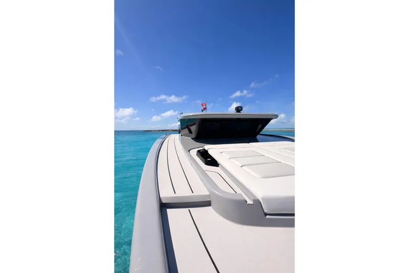Slide: The Image of 2026 Sunreef Ultima yacht on clear blue water under a bright sky. - 7