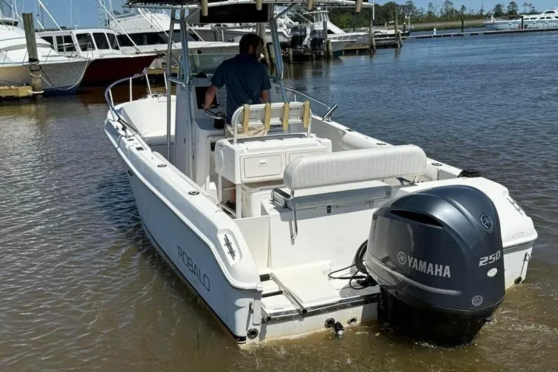 Slide: The Image of 2003 Robalo R230 Center Console boat with Yamaha 250 engine at dock. - 3